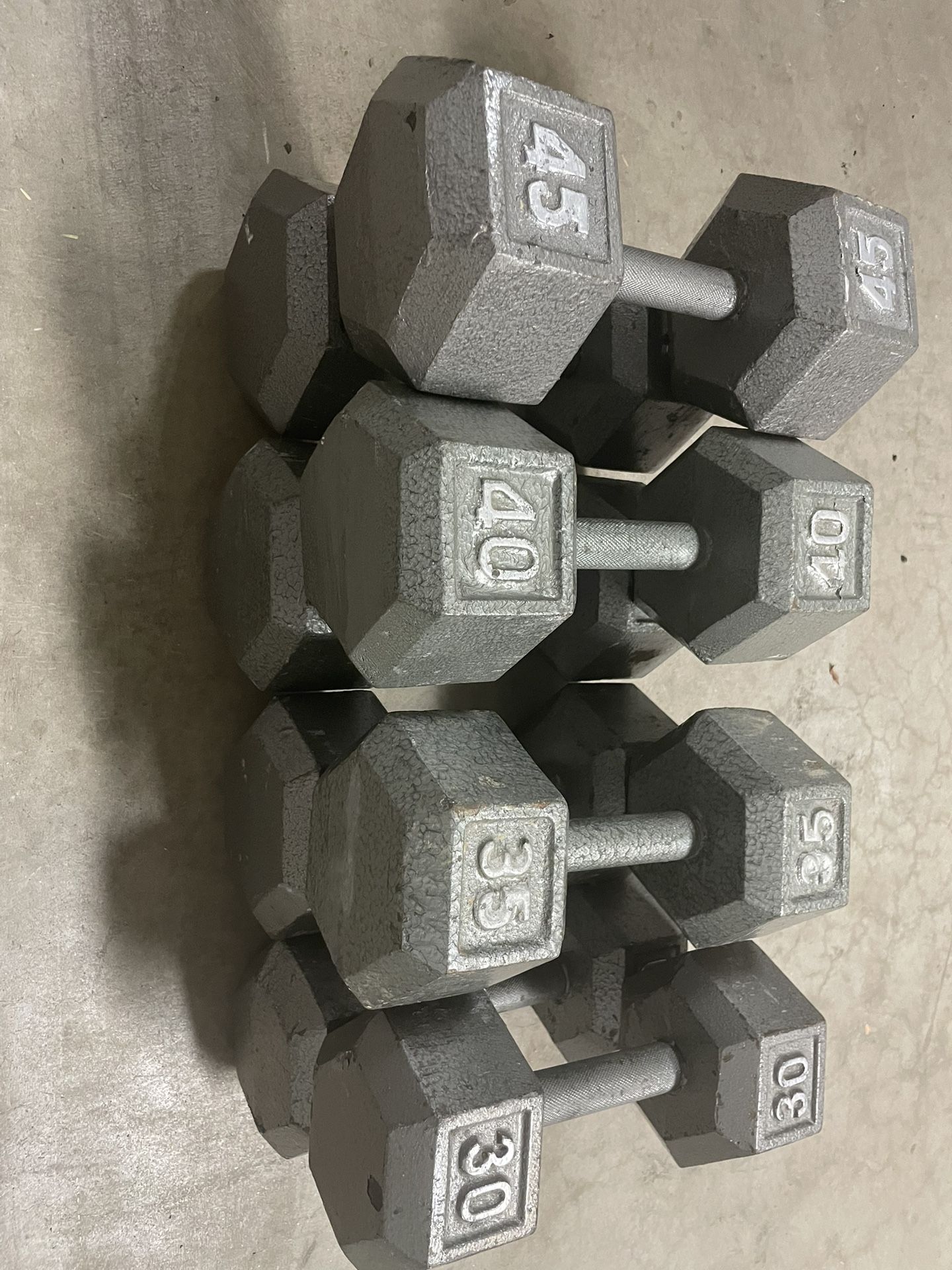 Iron dumbbell pairs: 30 + 35 + 40 + 45
