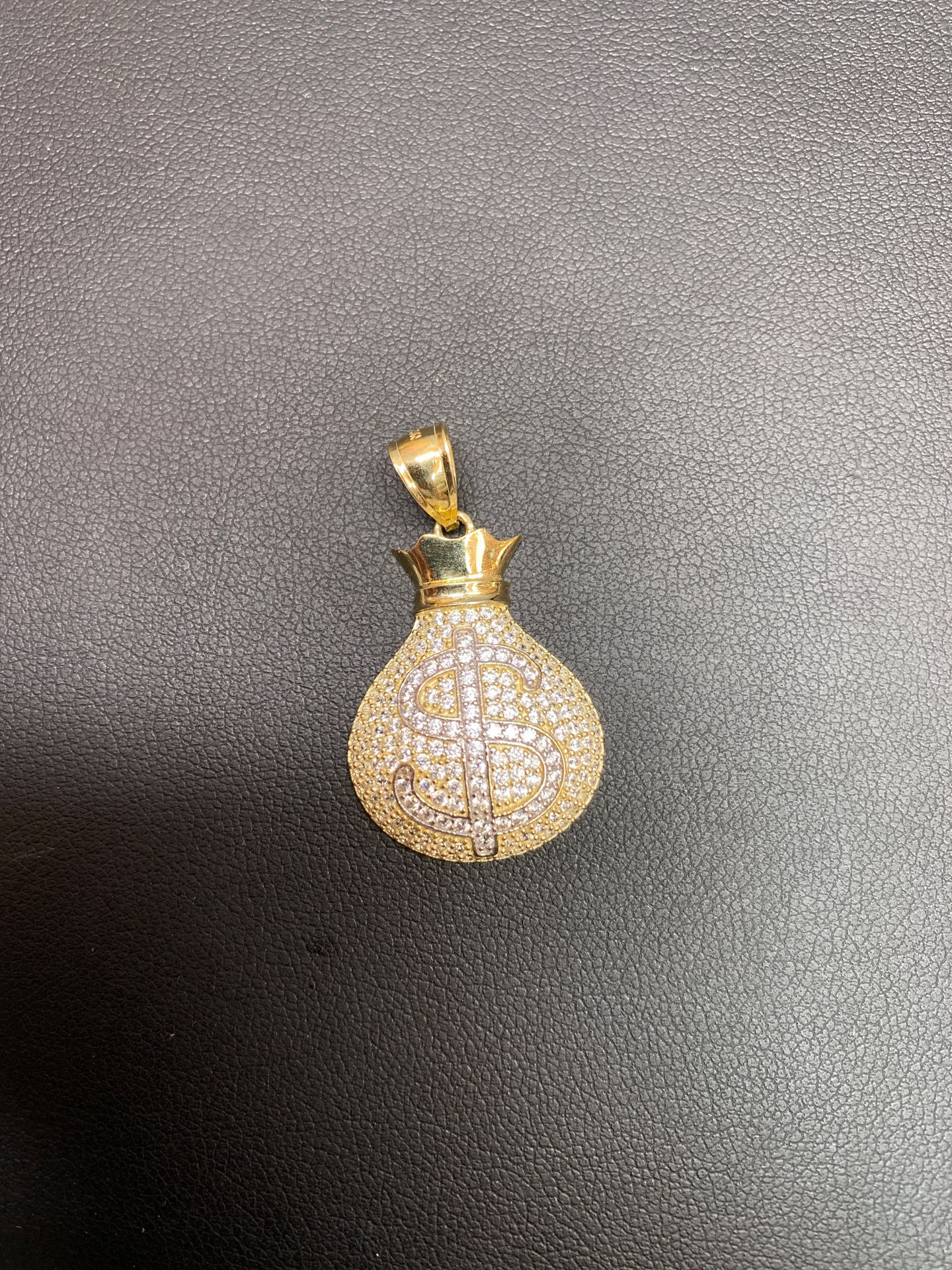 10k real solid gold pendant with Crystals. 1.25” high