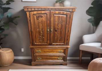 Wooden Armoire with Carved Design