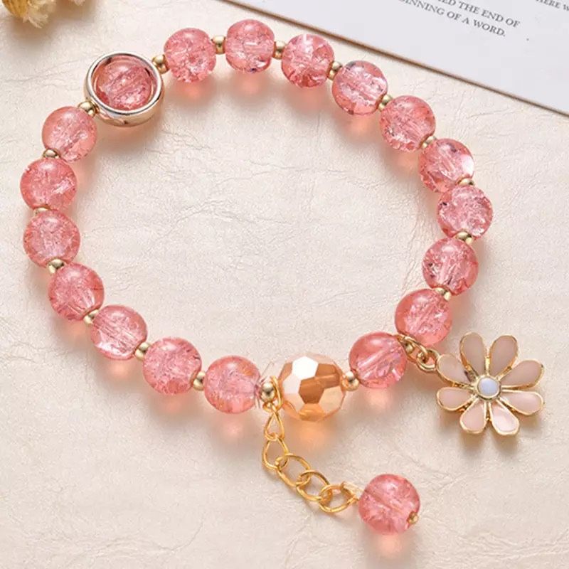 Beautiful bracelet with a daisy charm (PINK)