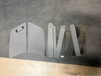 Adhesive surfboard deck grip