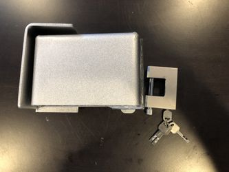 Bolt on lockbox for shipping containers