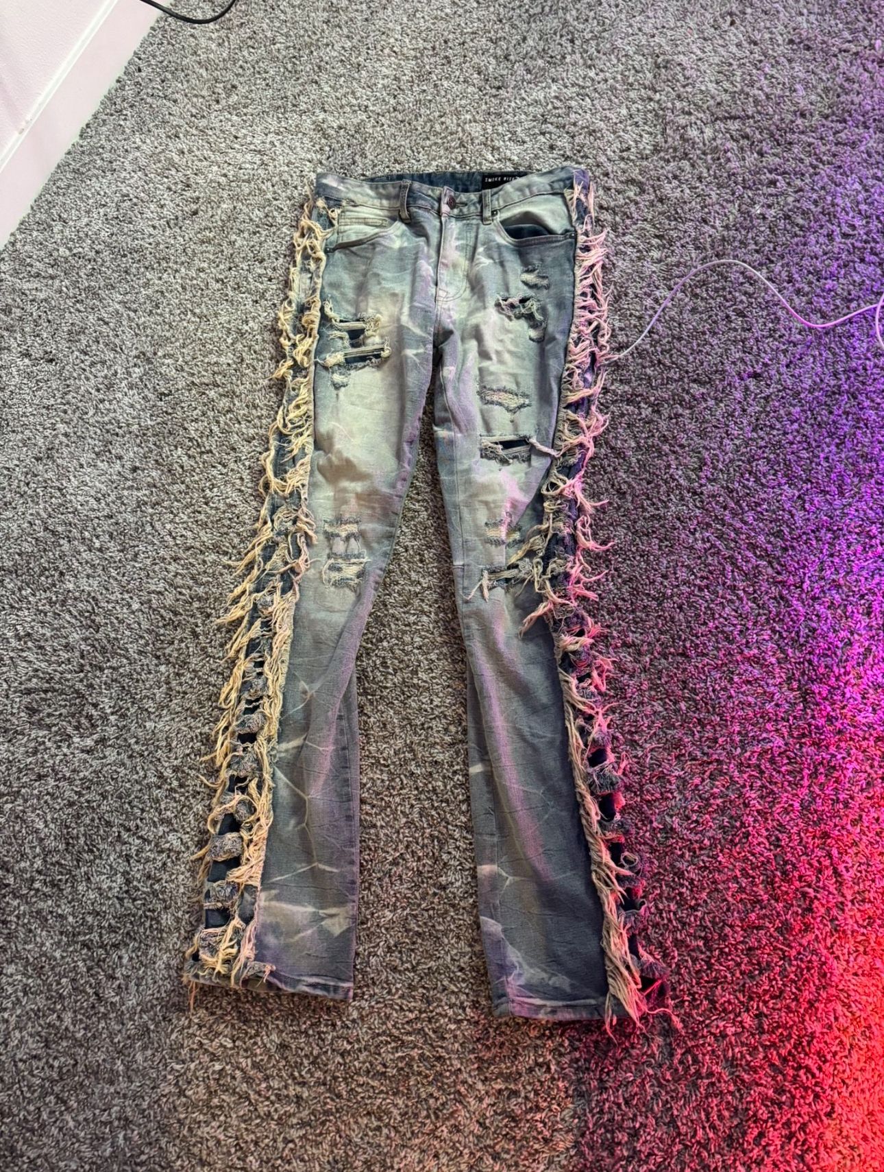 Blue Distressed Stacked Jeans With Hang Tag On Back