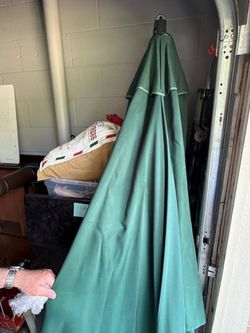Outdoor umbrella with base
