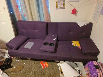 Small purple futon sofa