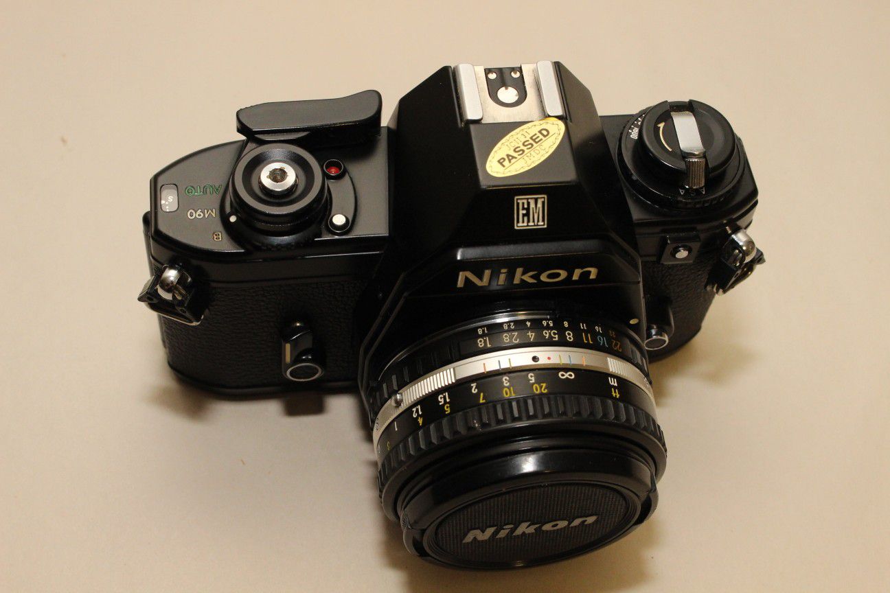 Nikon EM 35 MM Vintage film SLR camera 50 MM Lens & pouch/case