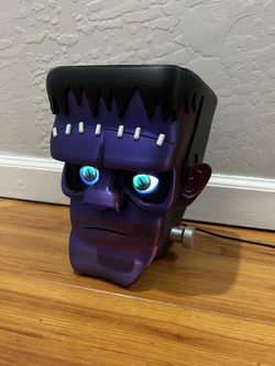 Frankenstein Head Unique with LED eyes that move. Remote included