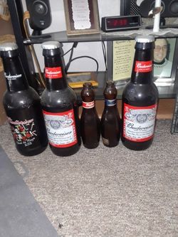 3 Big Budweiser Bottles Plus 2 Bowling pin Bottles