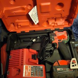 Milwaukee 1/2"drive Impact Gun With 2 New Batteries Charger And Case