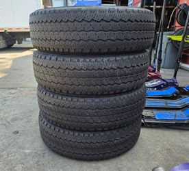 LT 275 65 20 BRIDGESTONE DUELER A/T - SET OF 4 USED