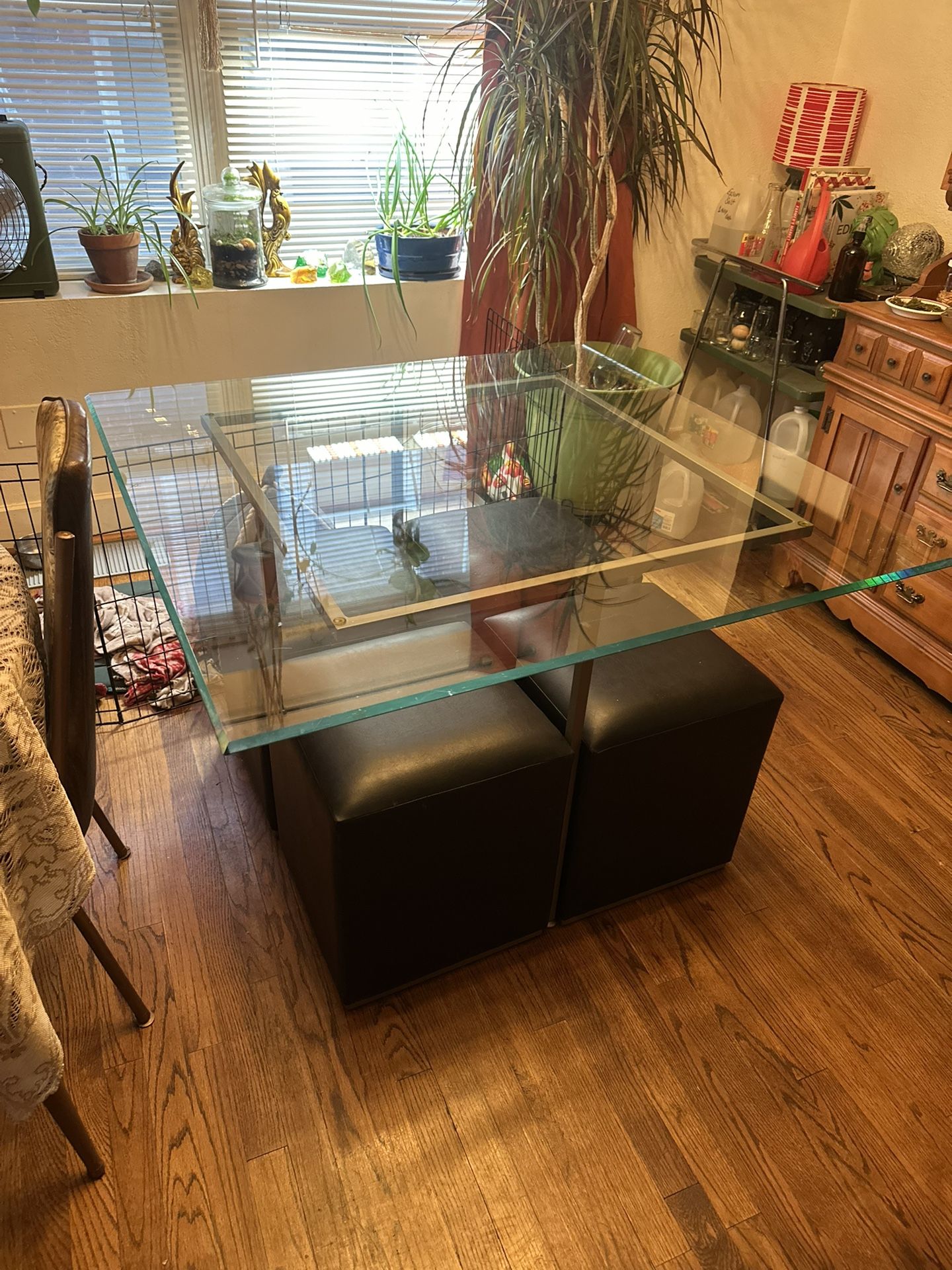 Square glass table with hiding chairs