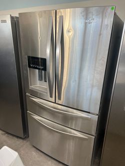 Whirlpool stainless steel 4 door refrigerator -free delivery 120 day warranty