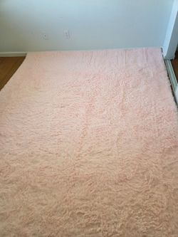 Pink 8x10 padded shaggy area rug with slip prevention backing