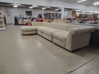 Beige 4 piece sectional w/ ottoman