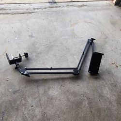 Actuating Arm Tablet Holder