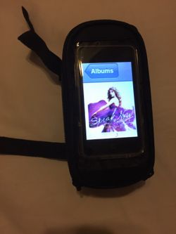 Cell phone bike riding pouch with headphones outlet