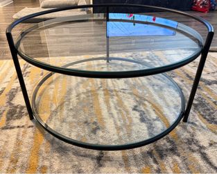 Round glass coffee table