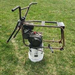 Vintage minibike frame with engine