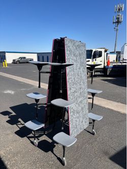 Foldable table with attachable seats for 12 people