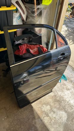 2003-2008 Toyota Corolla driver side rear door