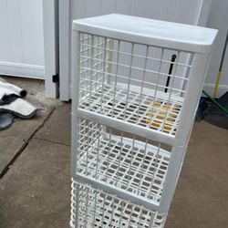 A Nice , White Storage With4 Shelves ( Two Separate Ones On Top Of Each Other) ( NO SHIPPING)