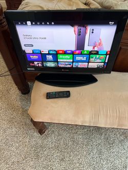 Sharp 26” flat screen TV - With built in DVD player