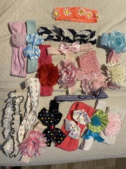 Lot of 18 baby girl headbands.