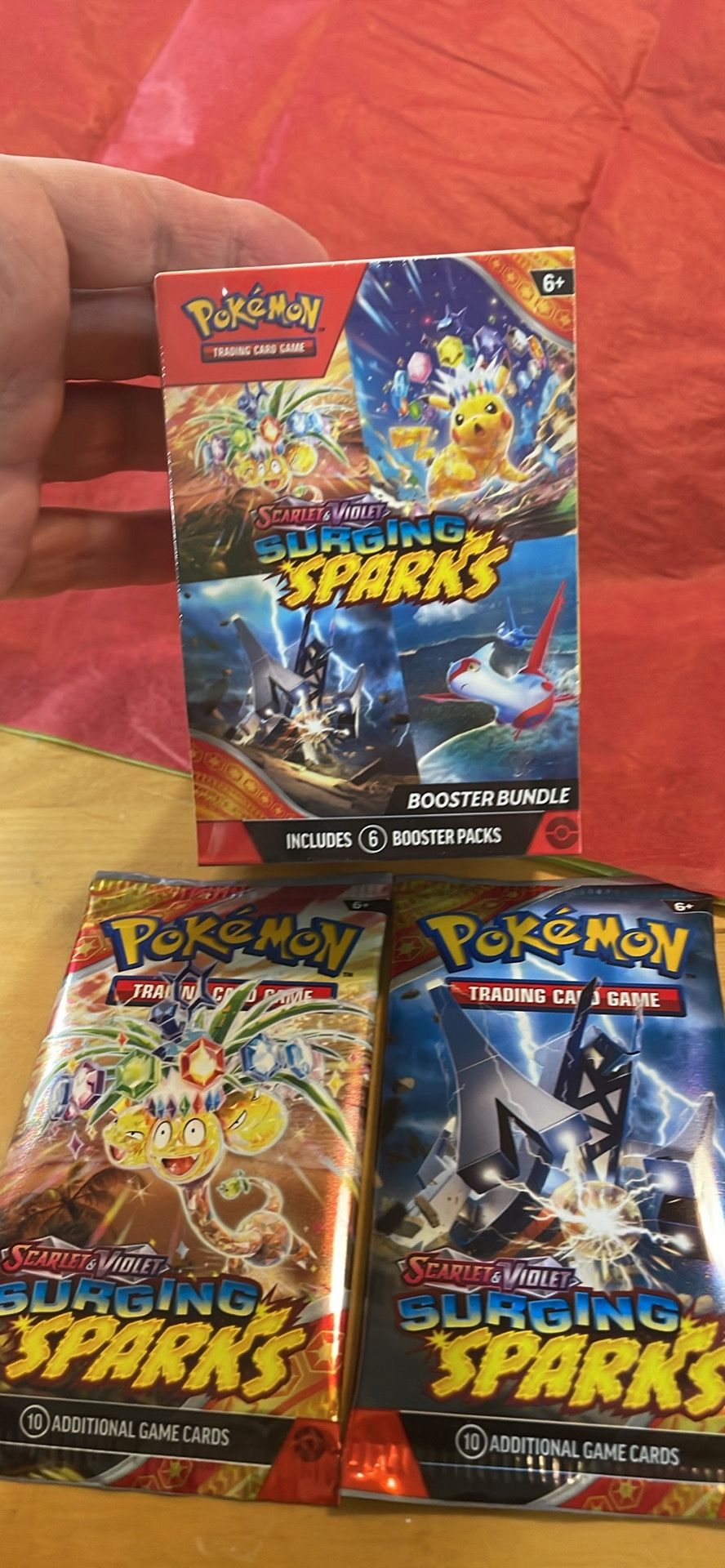 Pokémon Surging Sparks Booster Bundle & 2 Packs 