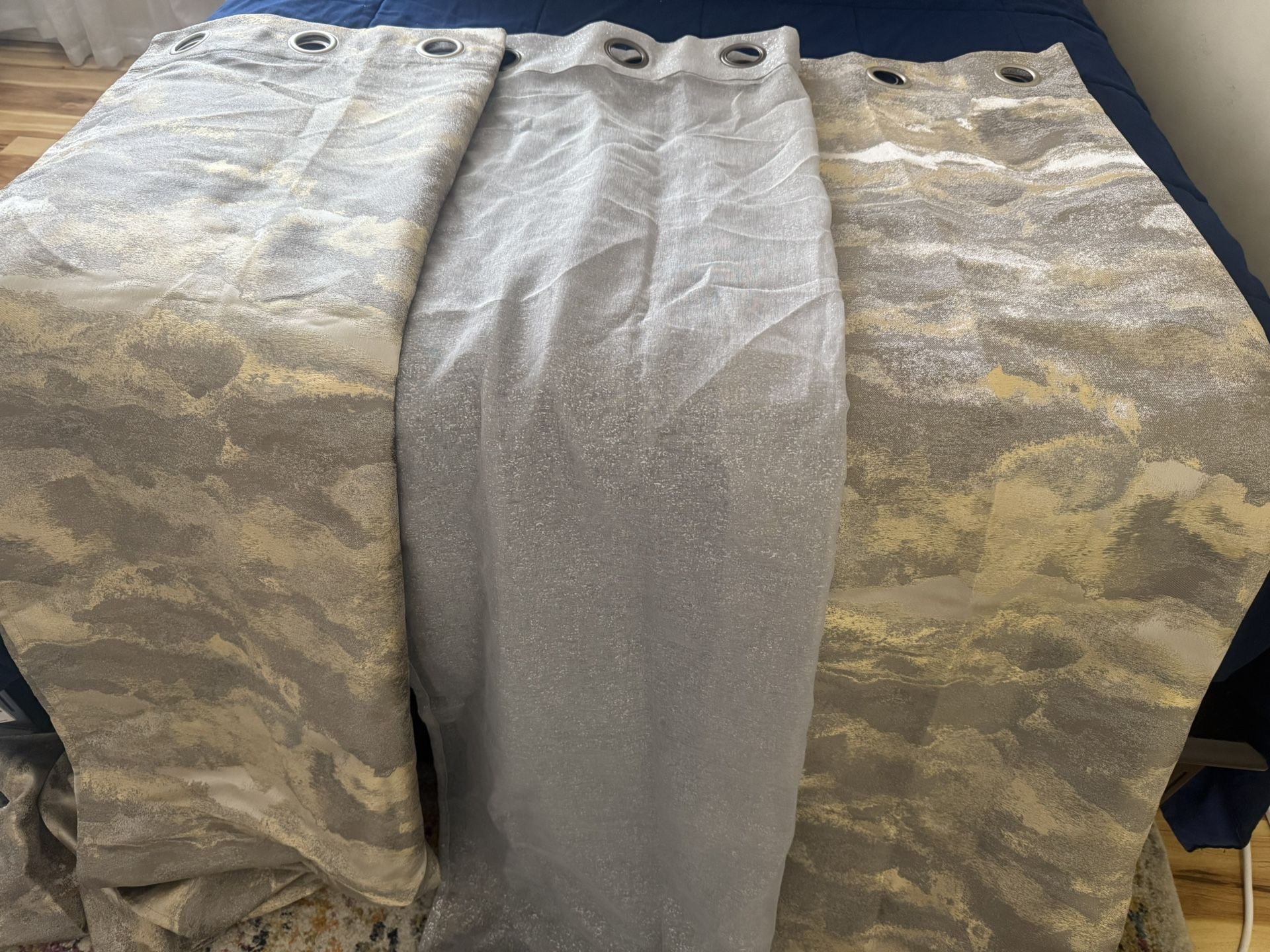 curtains gray bench and beautiful silver mirror