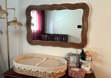 Girl nursery furniture dresser mirror changing table rocking chair crib rug curtains lamp