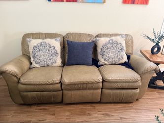 Tan leather couches