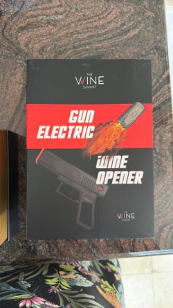 Pistol wine bottle opener.