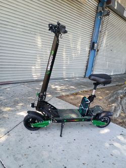KOOMAMBA E.SCOOTER 1200W +35MPH RANGE 40-50 MILES. NFC CARD. WITH REMOVABLE SEAT.
DUAL SUSPENSION
1200W Electric Scooter Adults Up to 35 MPH, 52V/20Ah