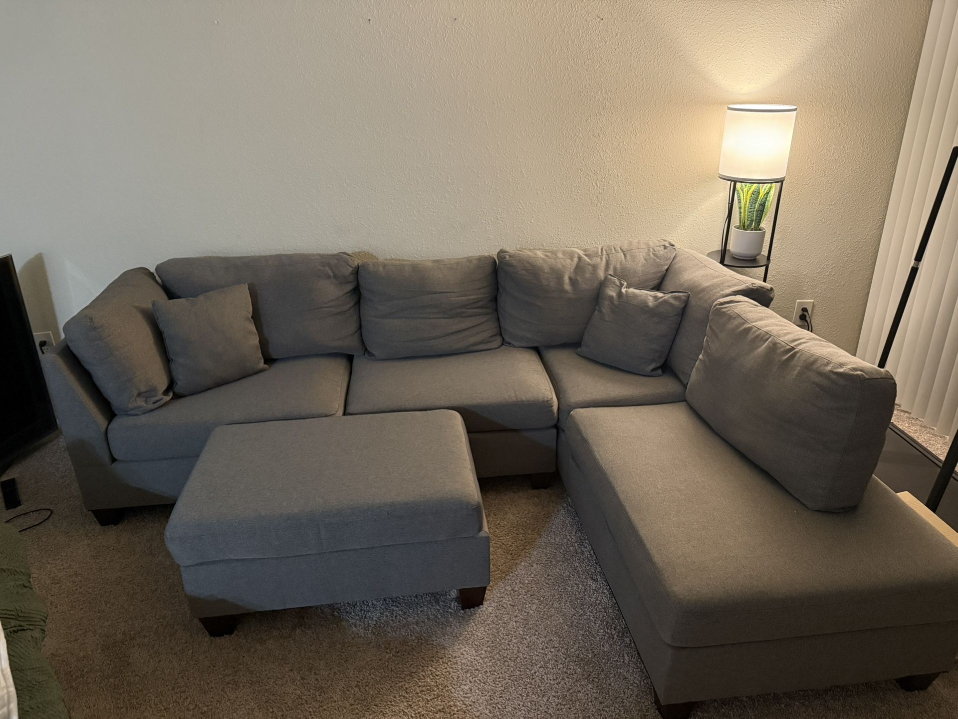 Gray Sectional With Ottoman