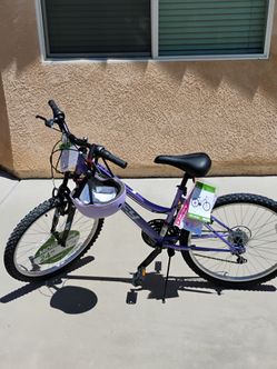 Brand New Granite Girls' Mountain Bike, 24-Inch, Purple. Plus a Glere helmet.