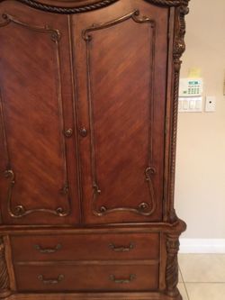 Beautiful king size bedroom set includes 2 nite stands tv console , excellent condition ! Non-smoking home !