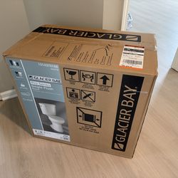 🚽 Brand New Glacier Bay Toilet – Still in Box
