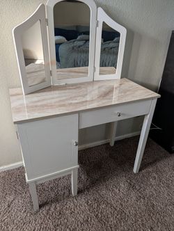 Vanity desk with mirror, drawer, and cabinet