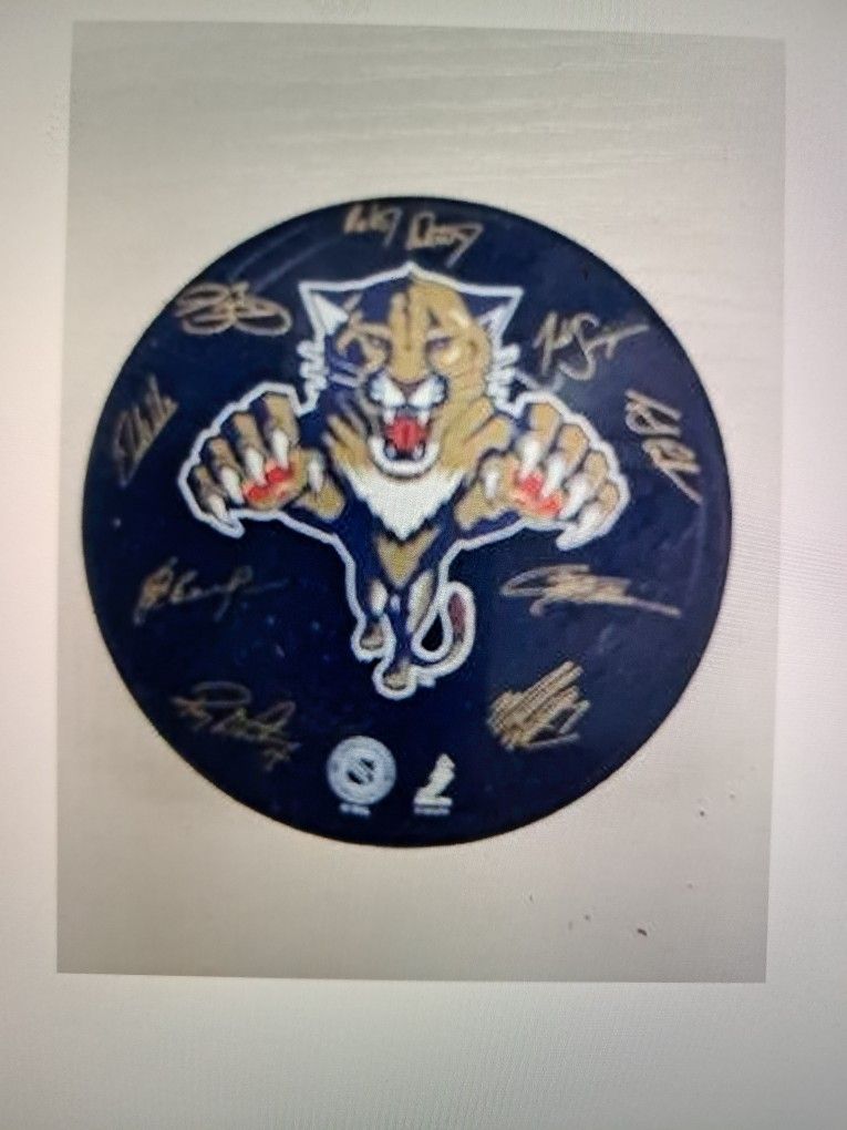 Florida pan thirteen signed hockey puck