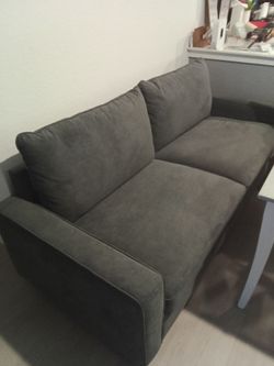 Dark gray sofa and love seat