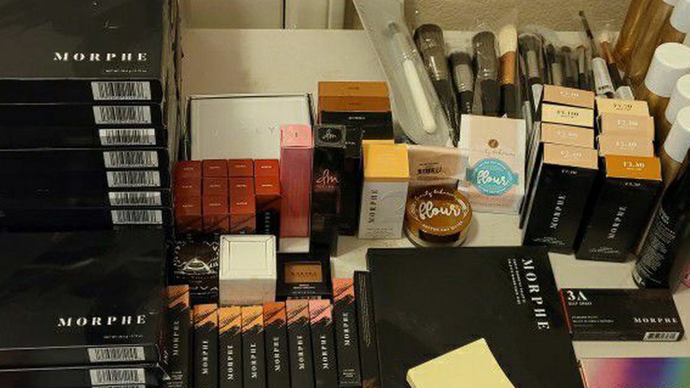Multiple palettes, foundations. Lip stick, lip gloss, and more