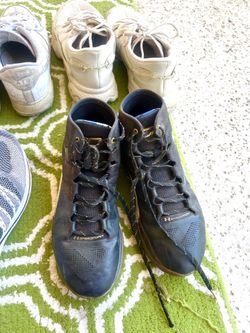 Black  color shoes size is 11.5