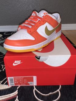 nike dunk low university gold