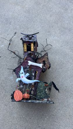 Metal haunted house tea, light holder