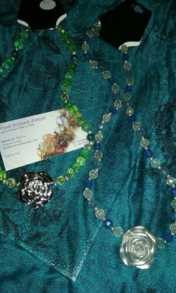 Great necklaces with that pretty rose