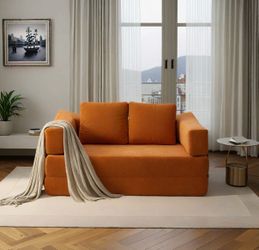 burnt orange boneless couch!