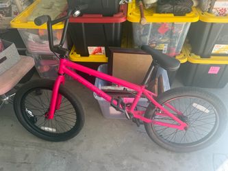 Pink elite BMX bike