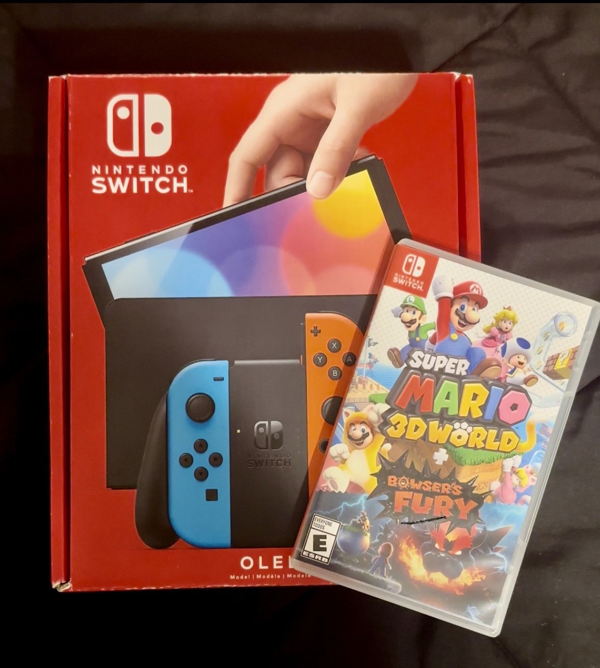 **Nintendo Switch OLED with Super Mario 3D World Bowsers Fury And 64 GB Micro SD