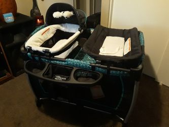 Stroller, car seat, playpen in yard