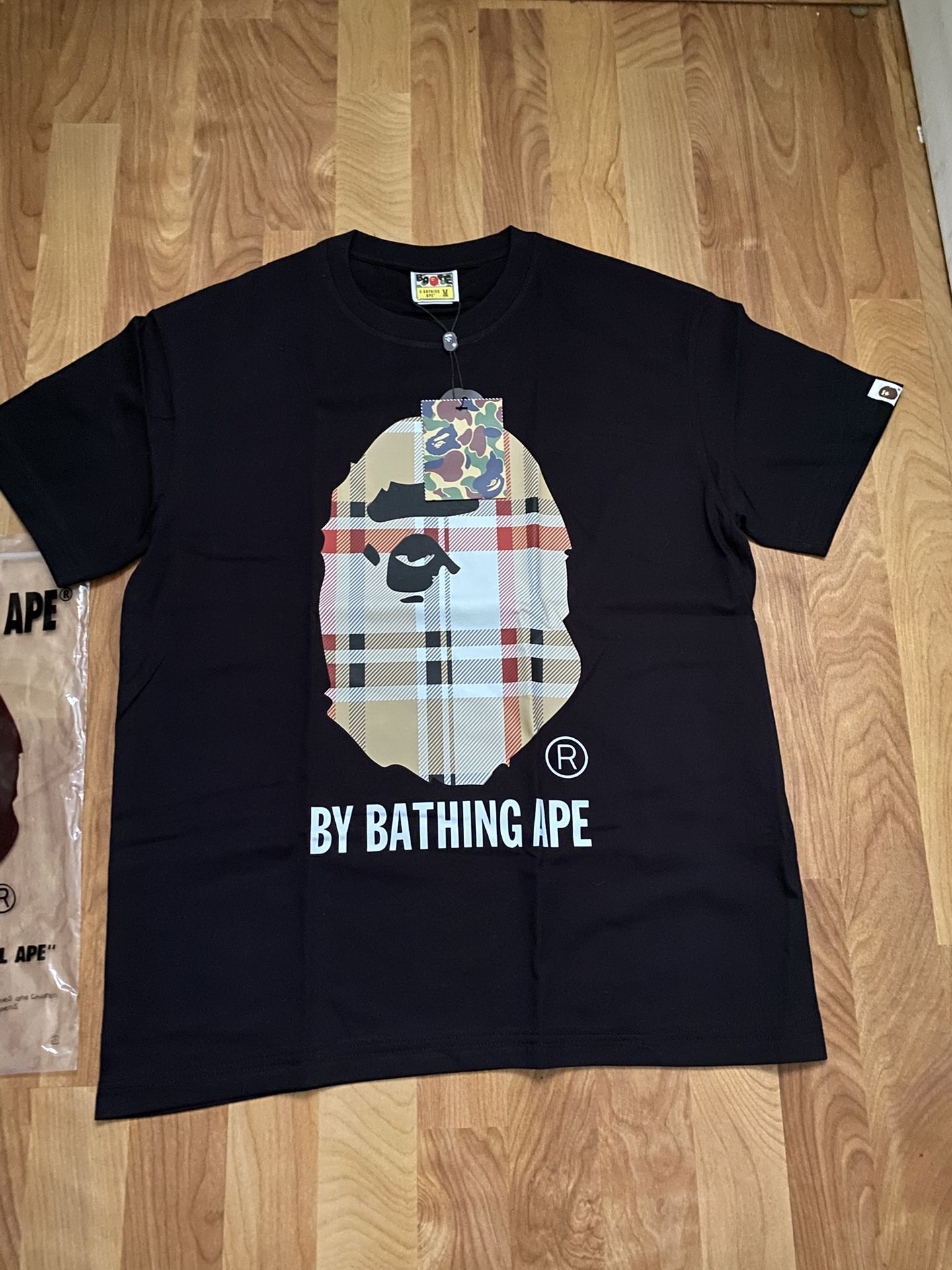 brand new size medium bape x burberry tee shirt